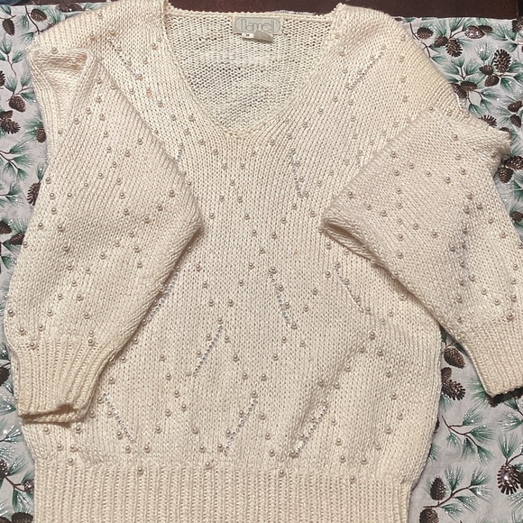 Nannell Tops - Chic Cream Sweater with Pearl Detailing